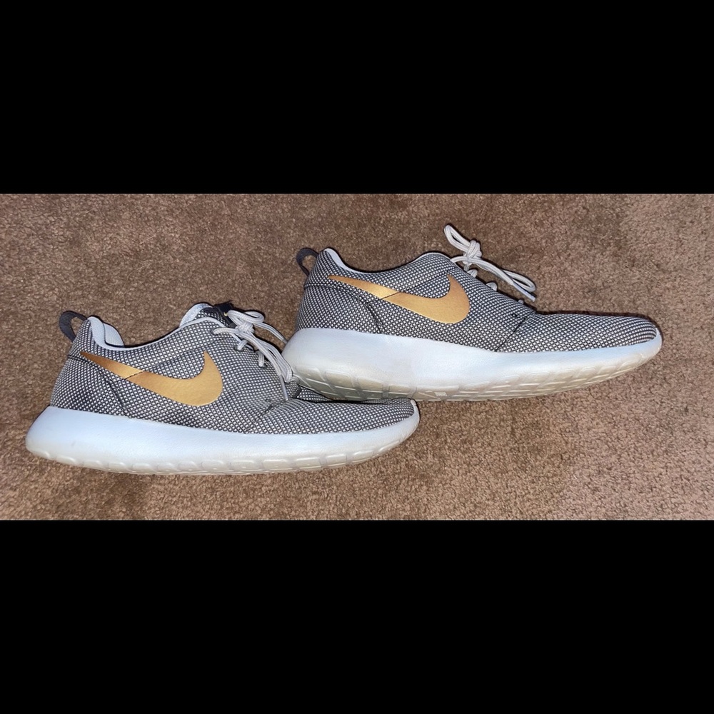 Women’s Grey and Gold Nike Roshes